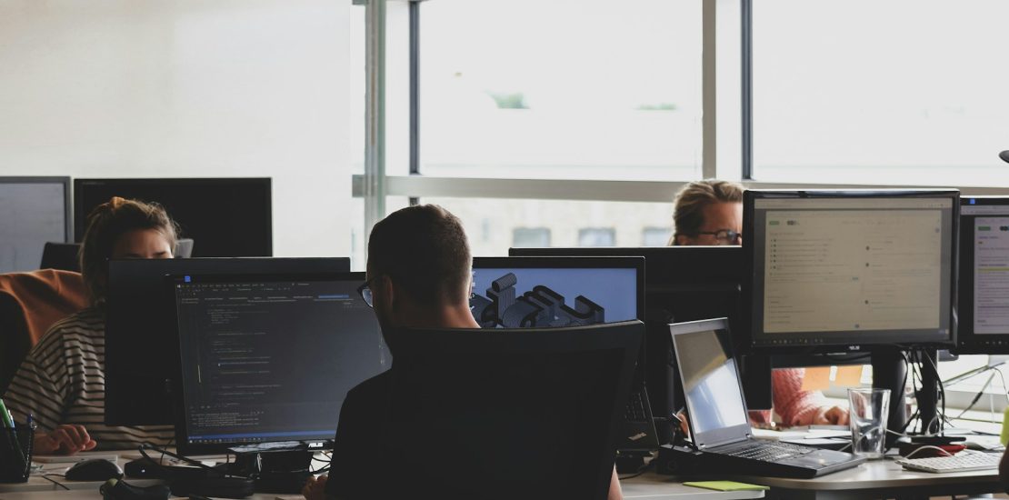 software app development company in Islamabad: people sitting on chair in front of computer monitor