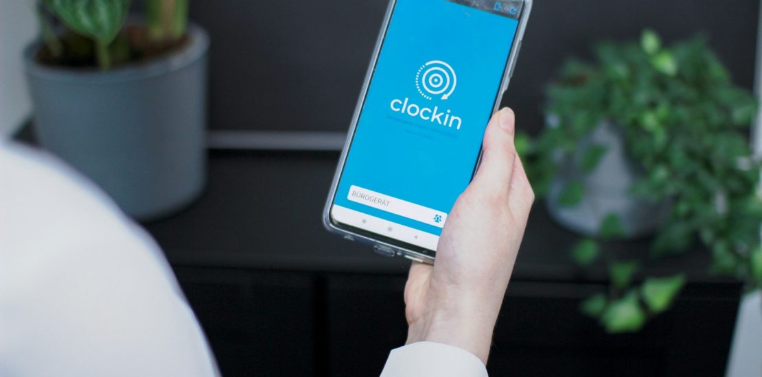 a person holding a cell phone in their hand with doctor appointment app